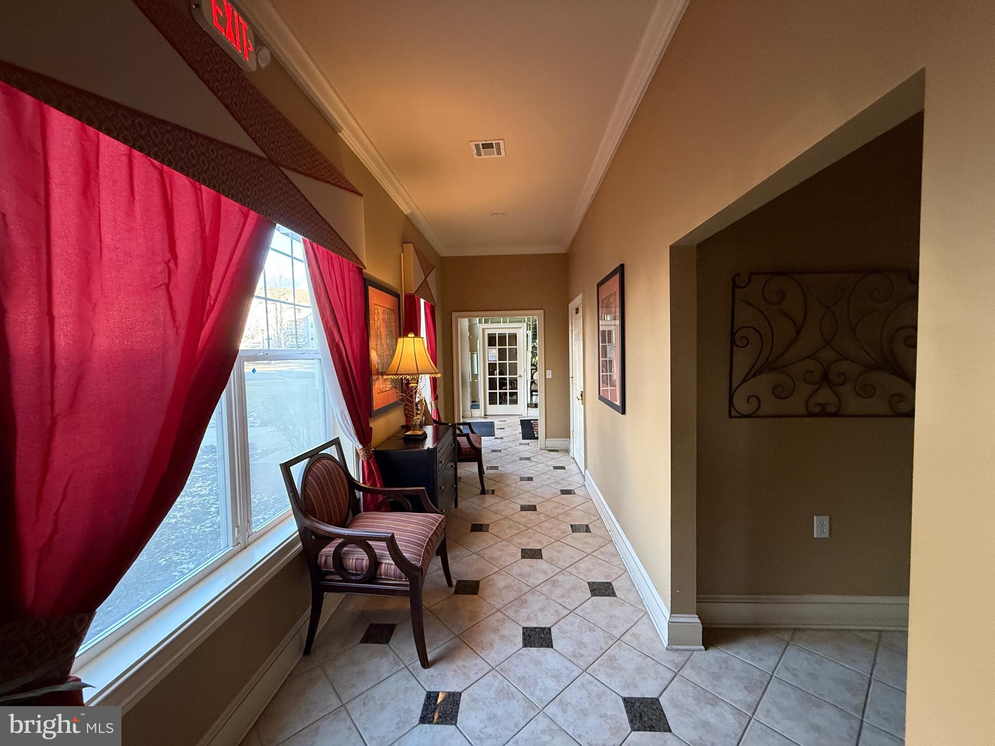 231 Masterson Court Ewing, NJ 08618 - Photo 42 of 43 a living room with furniture and a large window