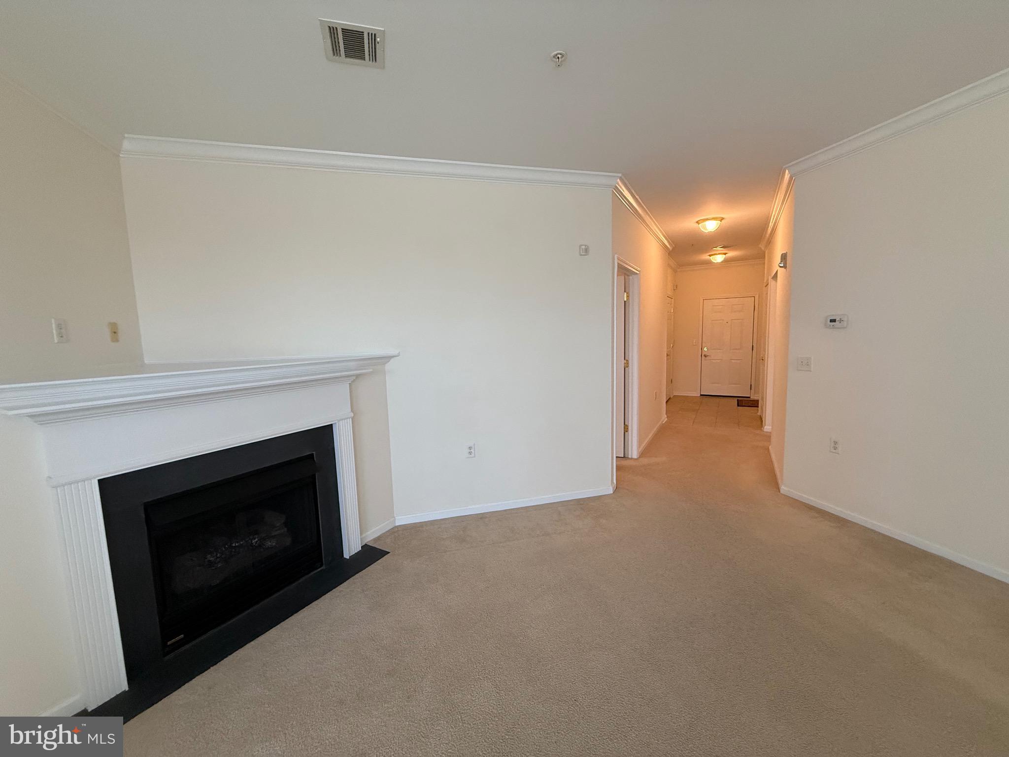 231 Masterson Court Ewing, NJ 08618 - Photo 9 of 43 a view of empty room with a fireplace