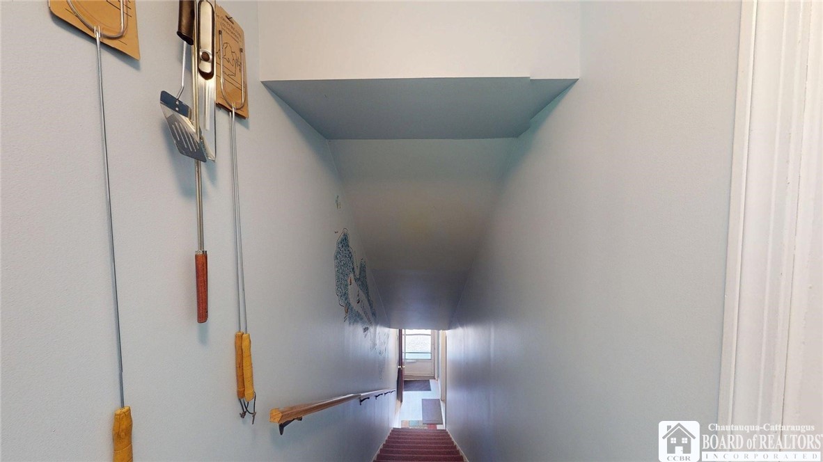 3981 Griffiths Bay Road Ellery, NY 14712 - Photo 32 of 50 Staircase to guest house above garage
