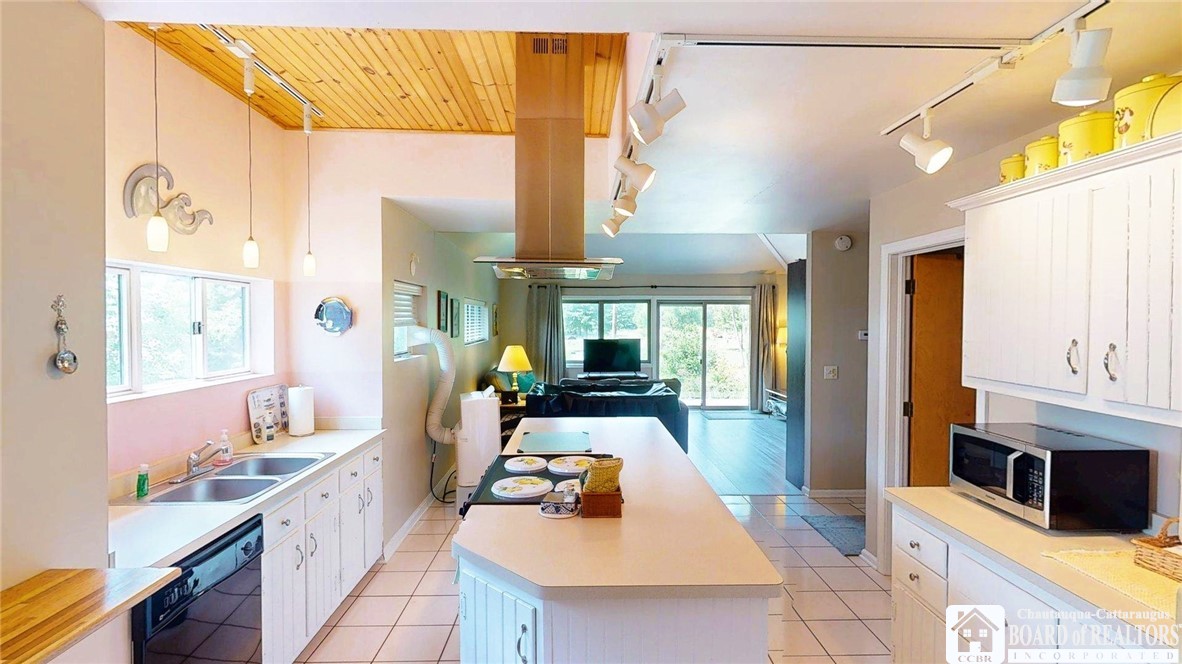 3981 Griffiths Bay Road Ellery, NY 14712 - Photo 39 of 50 Guest house kitchen looking towards the balcony