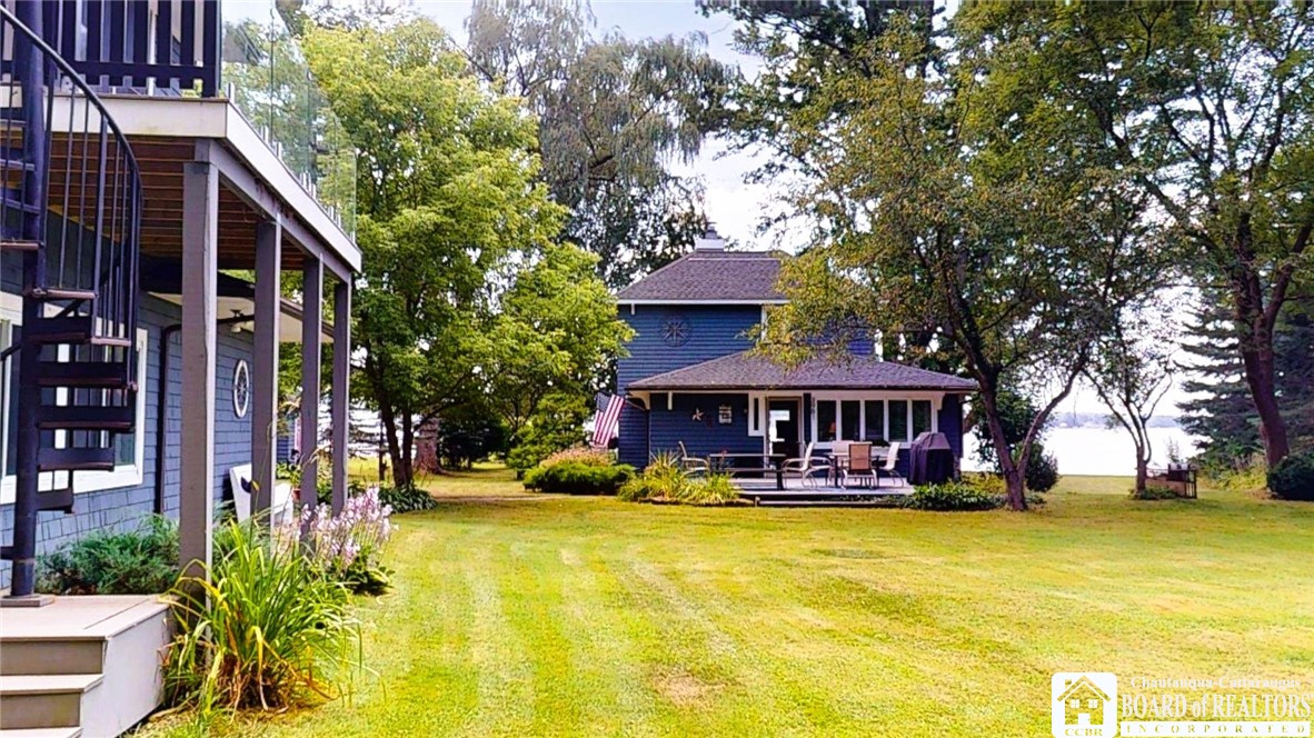 3981 Griffiths Bay Road Ellery, NY 14712 - Photo 4 of 50 Side yard and Spiral staircase to cozy guest house