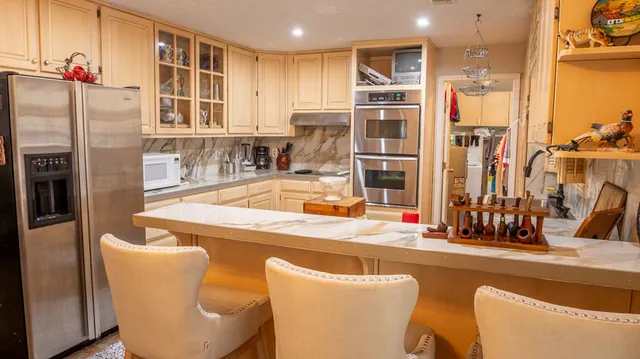 a room with furniture and a wooden floor