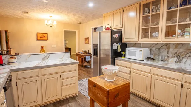 a room with furniture and wooden floor