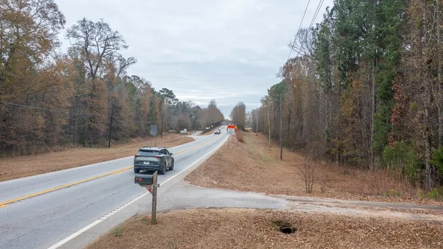 a view of a balcony with wooden floor