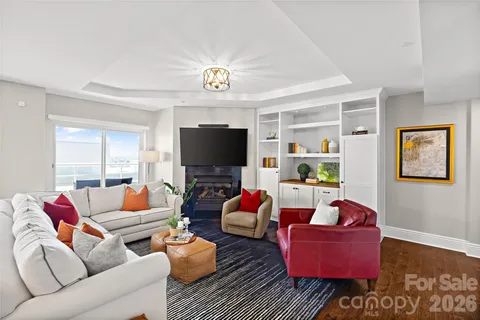 a living room with furniture or couch and a flat screen tv