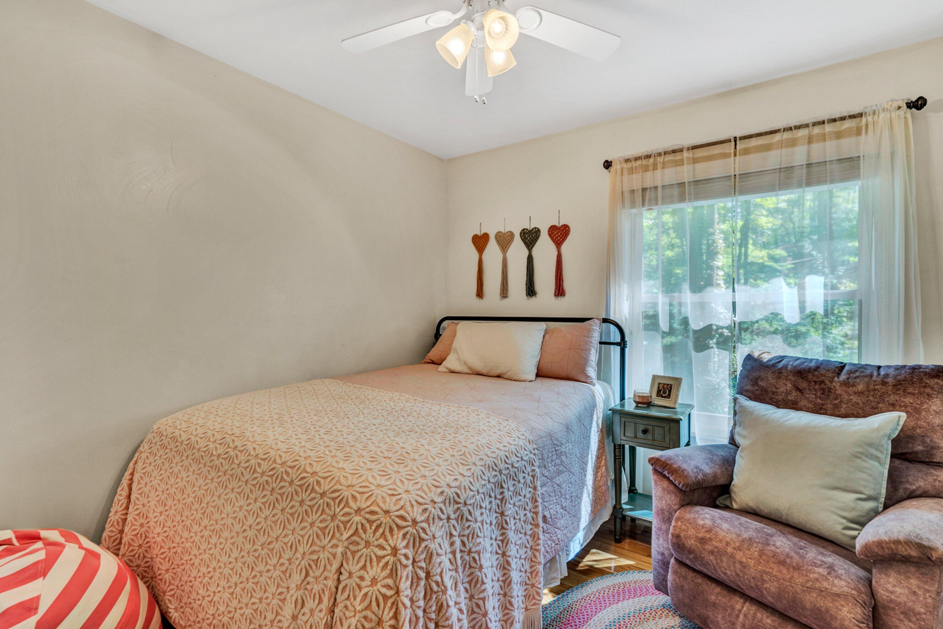 5606 MOUNT LAUREL Road Roanoke, VA 24018 - Photo 11 of 25 a bedroom with a bed and a large window