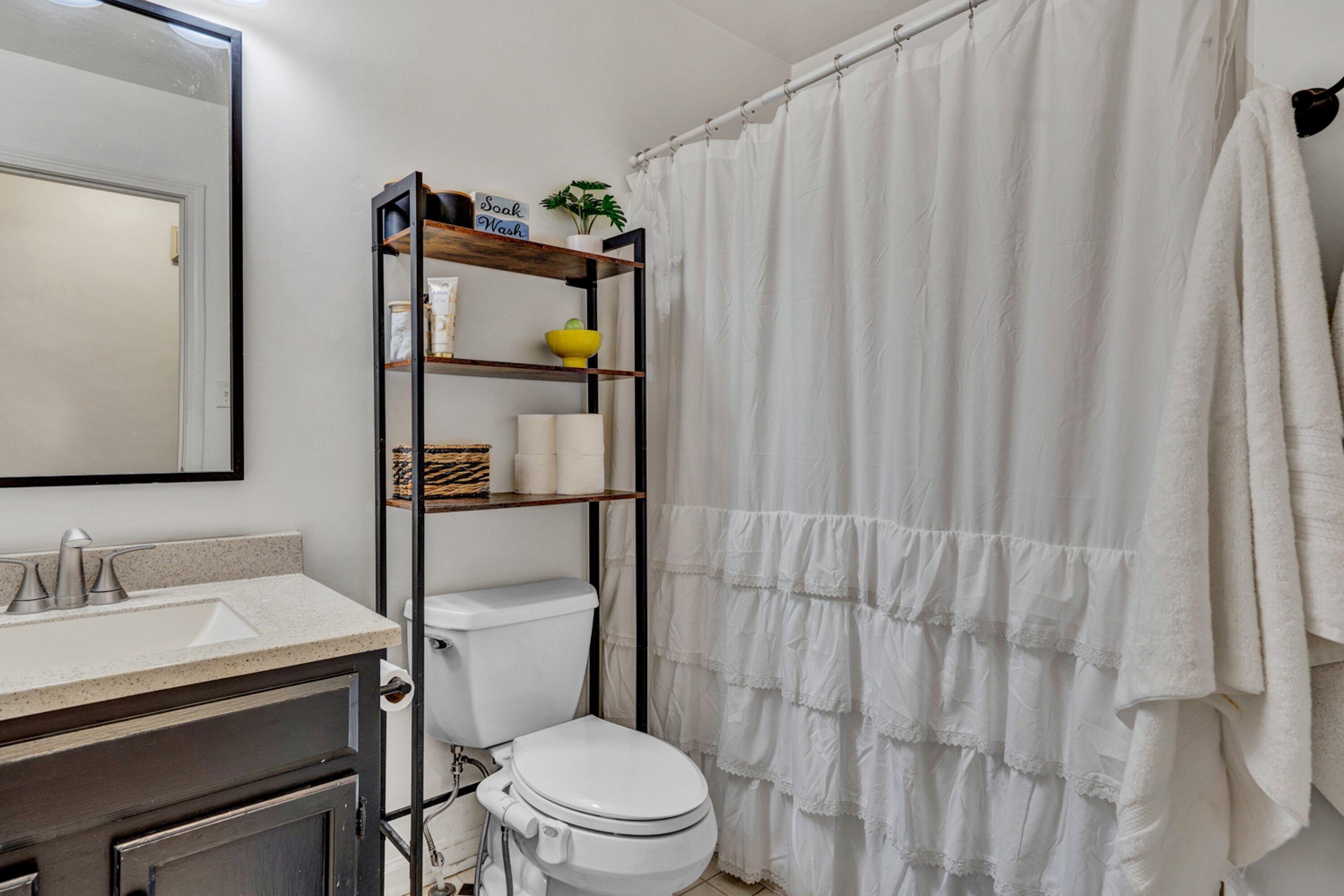 5606 MOUNT LAUREL Road Roanoke, VA 24018 - Photo 13 of 25 a bathroom with a sink toilet and mirror