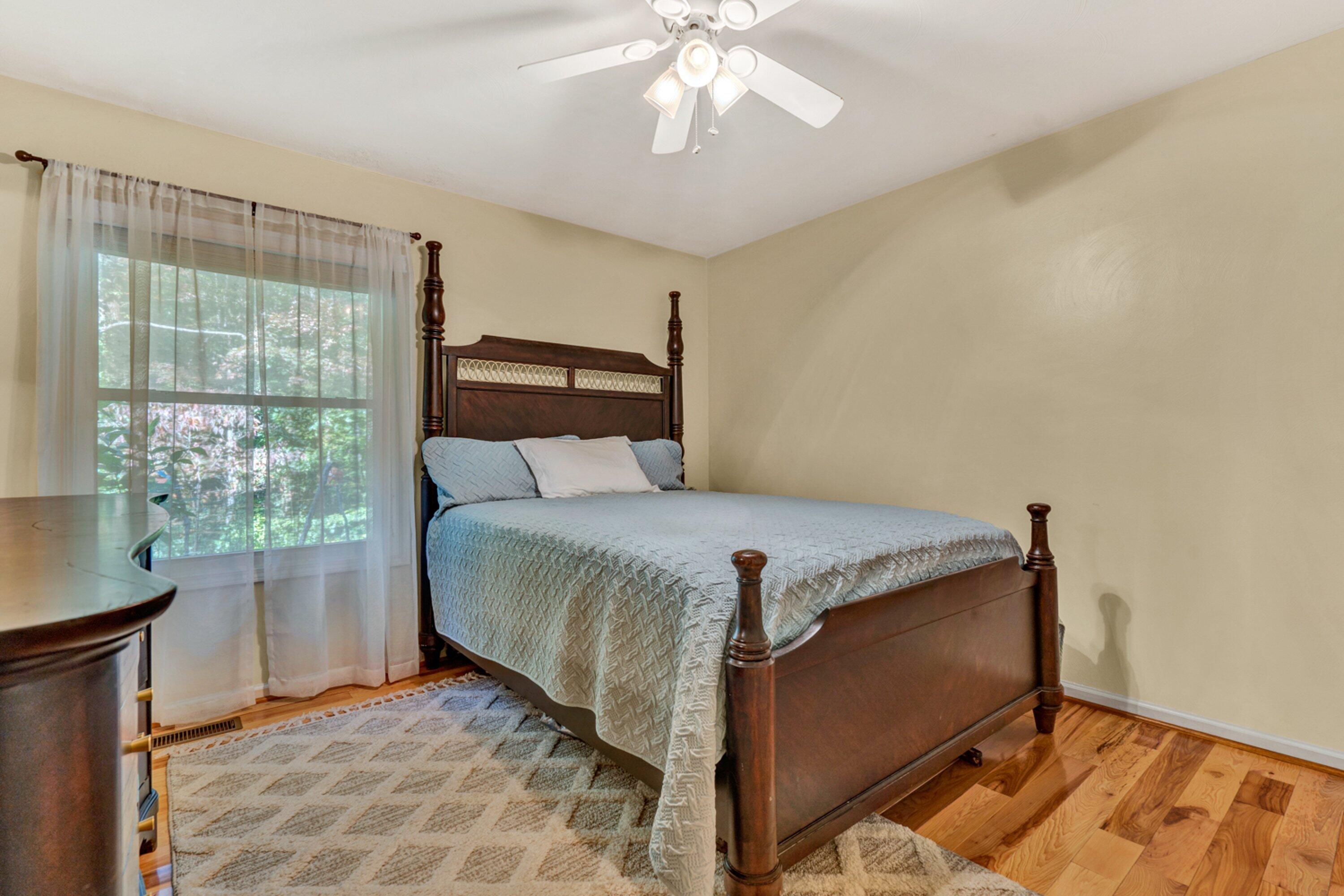 5606 MOUNT LAUREL Road Roanoke, VA 24018 - Photo 14 of 25 a bedroom with a bed and a window