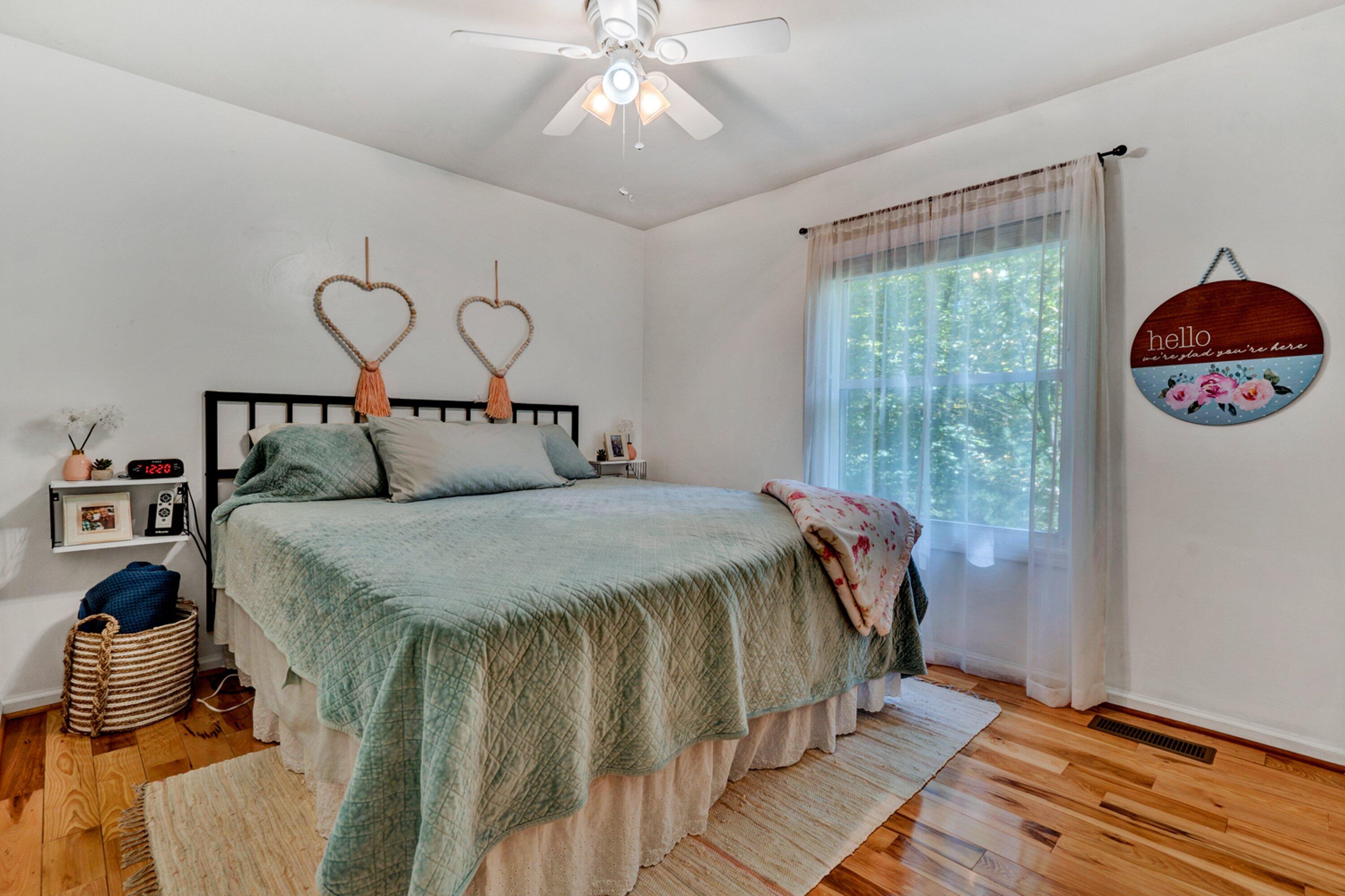 5606 MOUNT LAUREL Road Roanoke, VA 24018 - Photo 17 of 25 a bedroom with a bed and a window