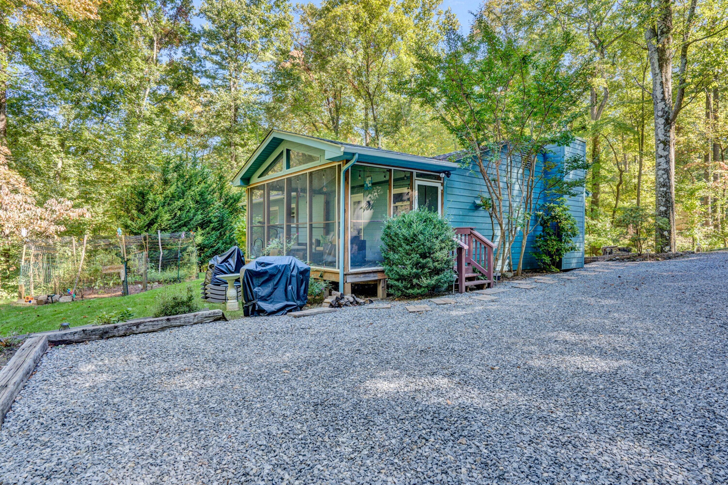 5606 MOUNT LAUREL Road Roanoke, VA 24018 - Photo 21 of 25 a view of a house with a small yard and large trees