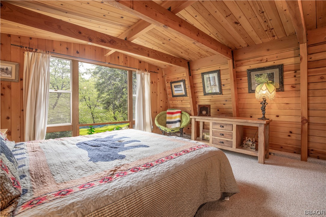 43527 Shasta Road Big Bear Lake, CA 92315 - Photo 14 of 25 a bedroom with a large bed and a large window