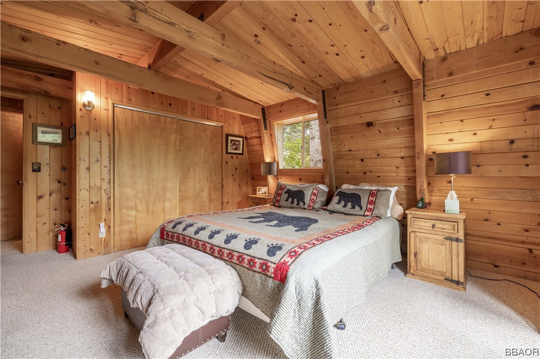43527 Shasta Road Big Bear Lake, CA 92315 - Photo 15 of 25 a bed room with a bed and a chair