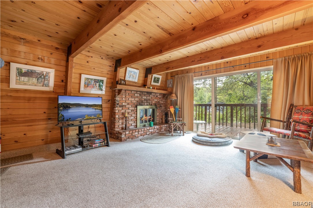43527 Shasta Road Big Bear Lake, CA 92315 - Photo 9 of 25 a room with furniture and a floor to ceiling window
