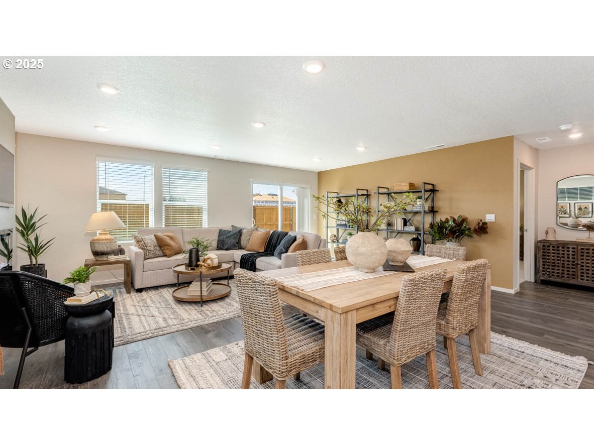 2887 V Street Springfield, OR 97477 - Photo 15 of 27 a living room with furniture a wooden floor and a large window