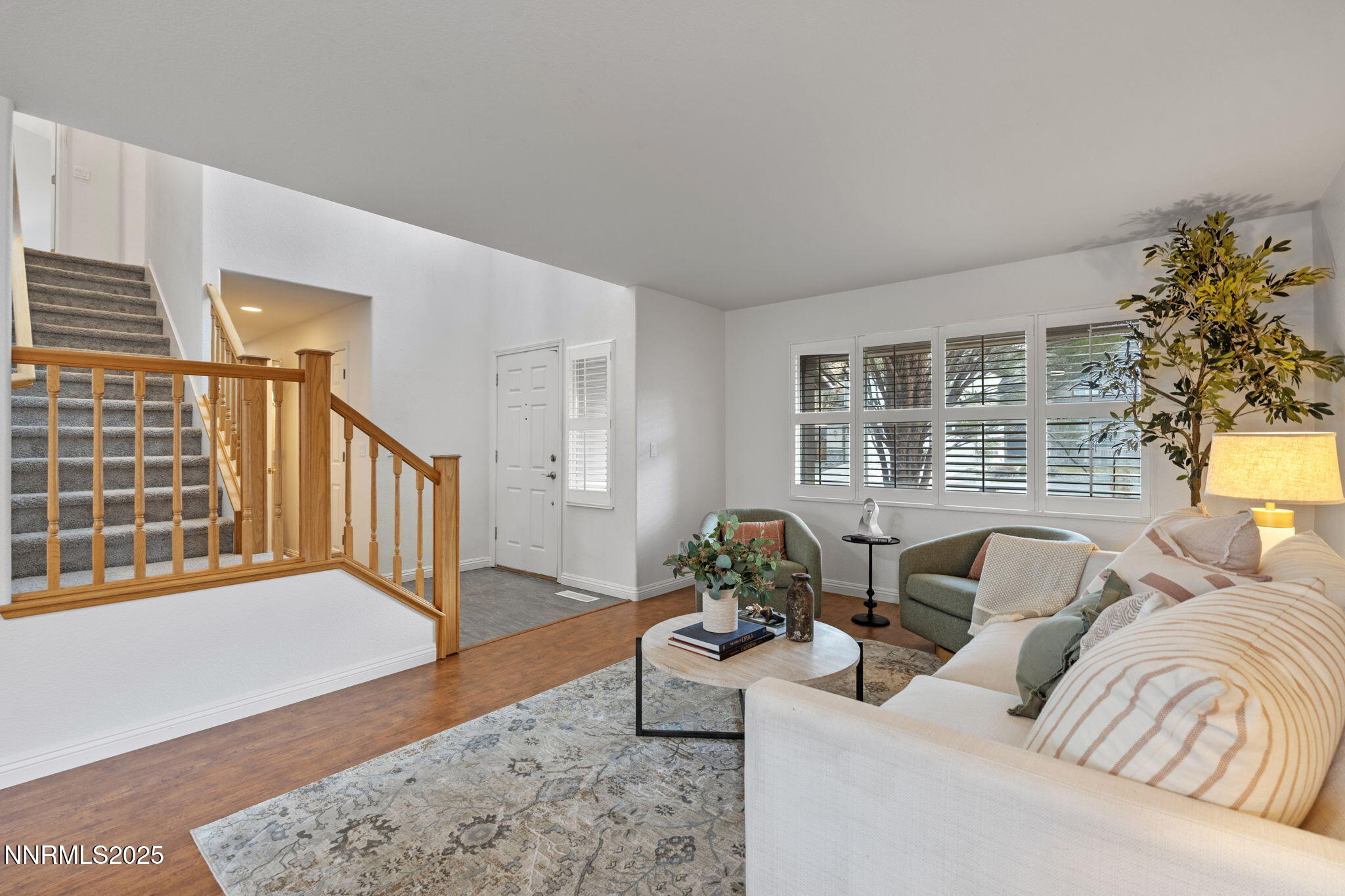 485 Corvallis Court Reno, NV 89511 - Photo 2 of 34 a living room with furniture and a potted plant