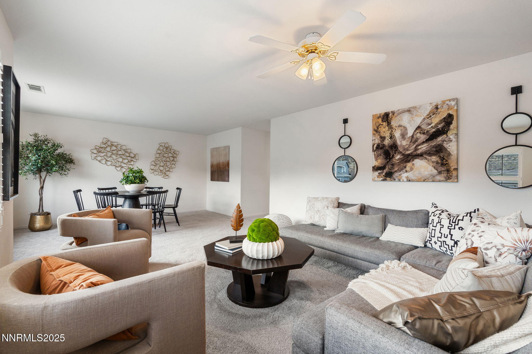 485 Corvallis Court Reno, NV 89511 - Photo 21 of 34 a living room with furniture and a chandelier