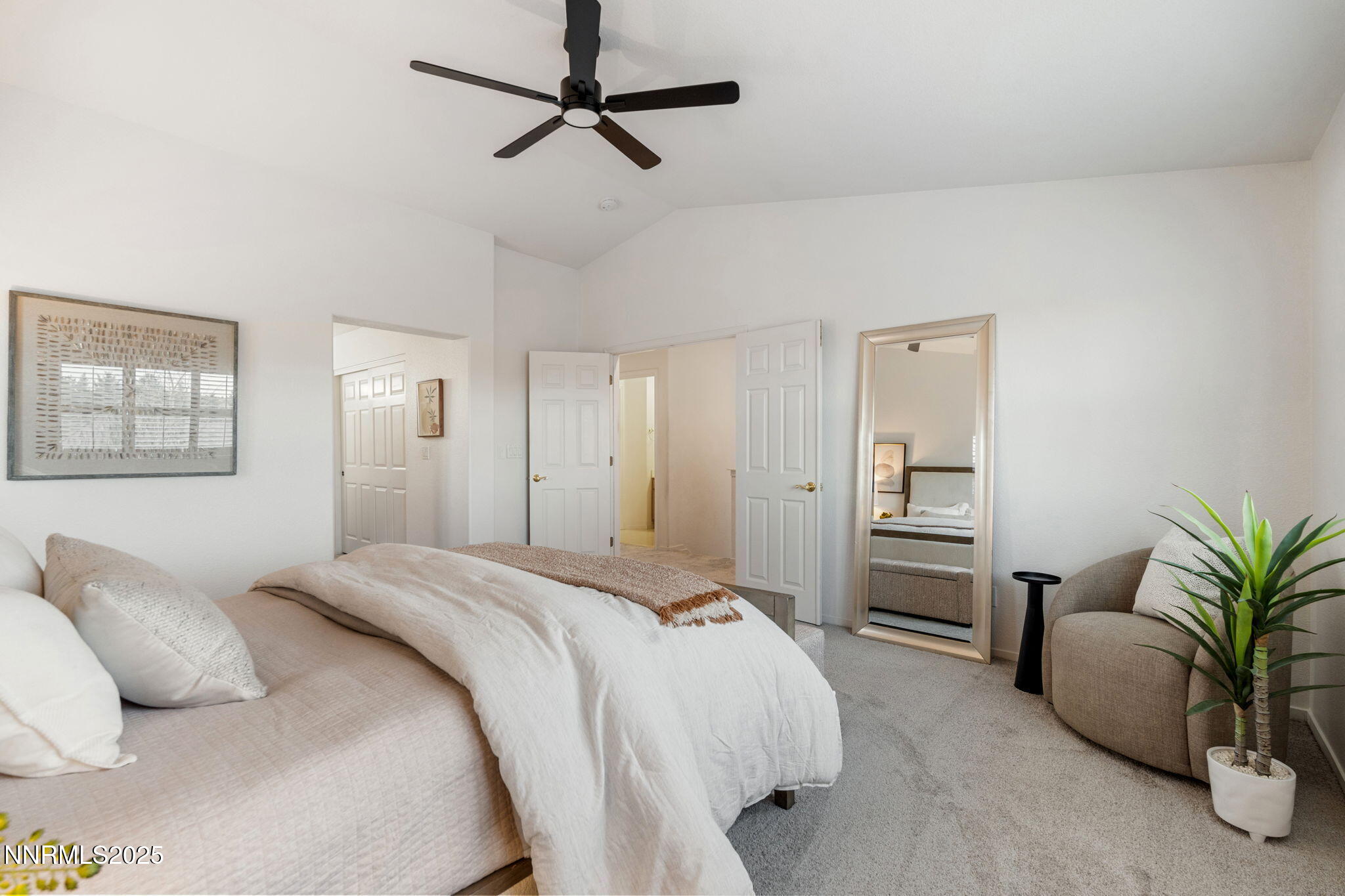 485 Corvallis Court Reno, NV 89511 - Photo 25 of 34 a bedroom with a large bed and furniture