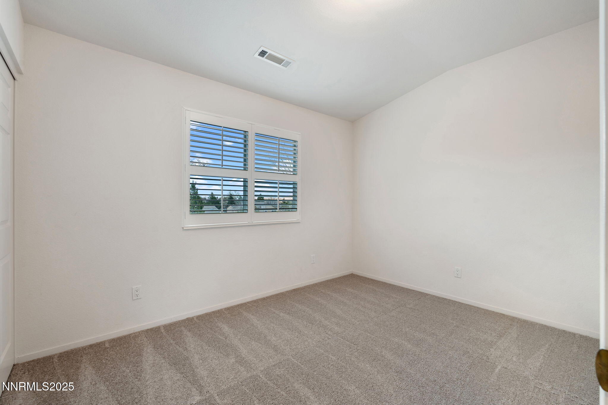 485 Corvallis Court Reno, NV 89511 - Photo 29 of 34 a view of an empty room with a window