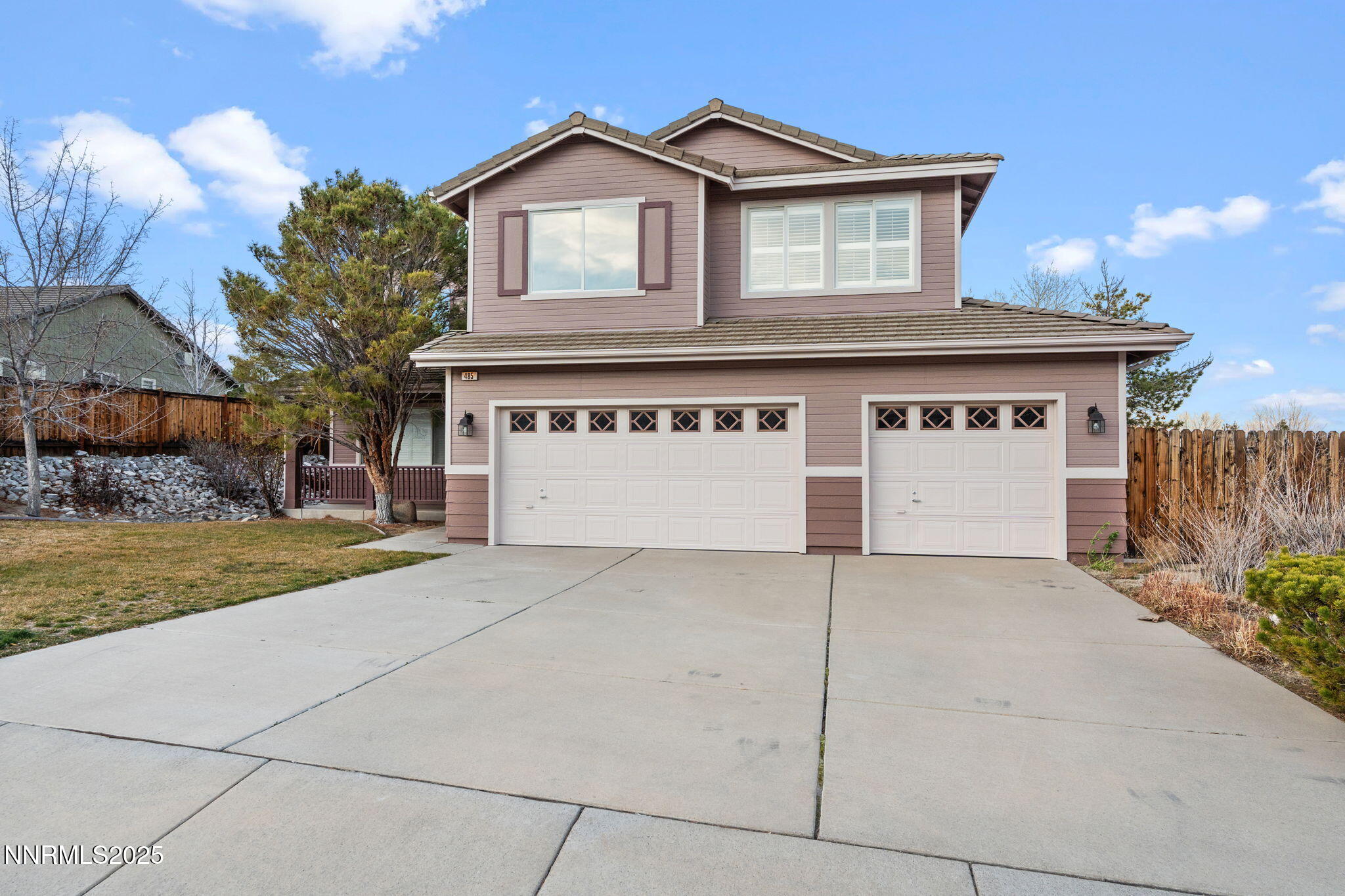 485 Corvallis Court Reno, NV 89511 - Photo 34 of 34 a view of a house with a yard and garage
