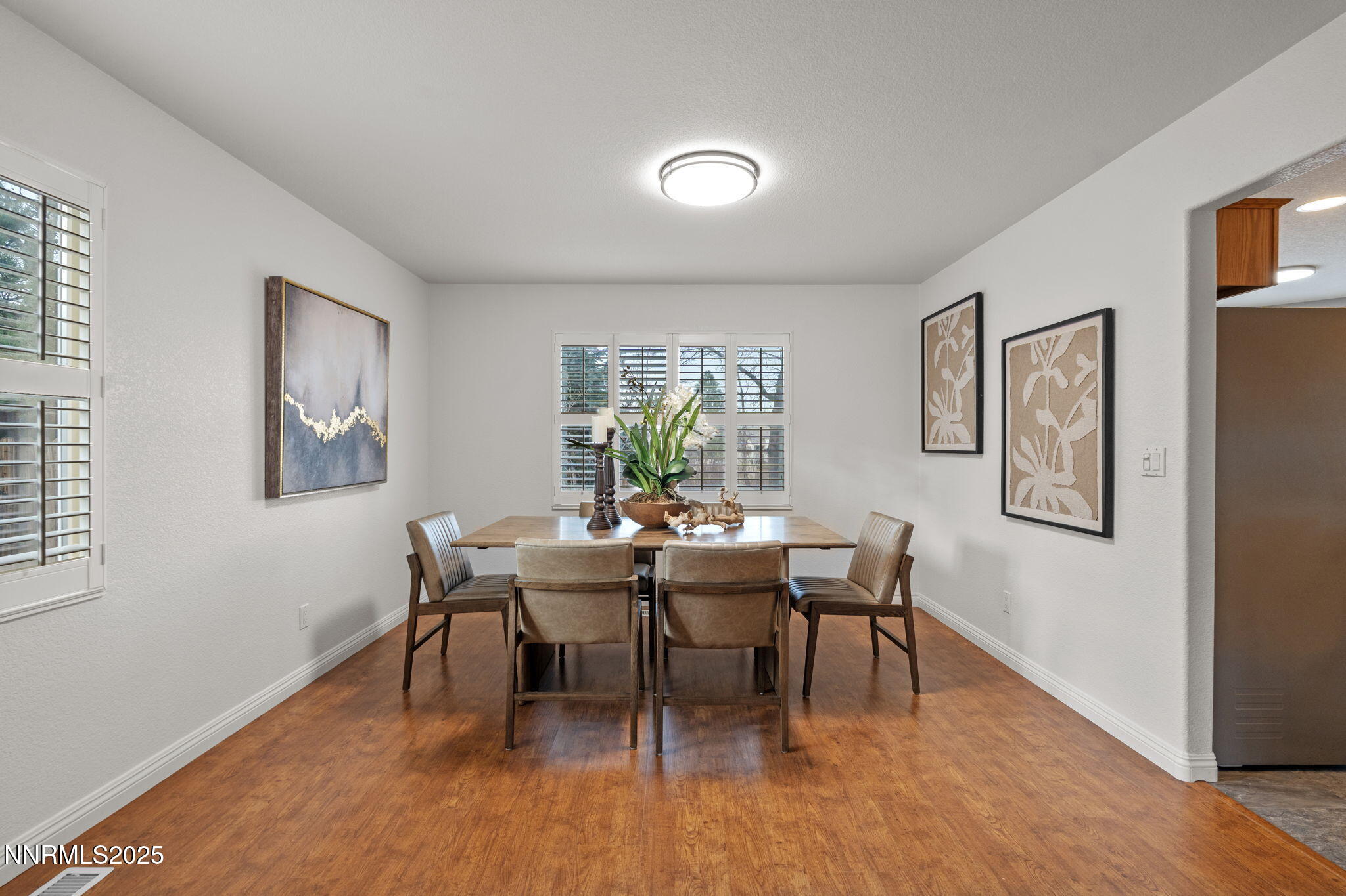 485 Corvallis Court Reno, NV 89511 - Photo 6 of 34 a view of a dining room with furniture window and wooden floor