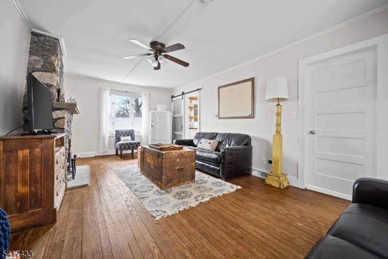 4 Dead End Road Newfoundland, NJ 07435 - Photo 12 of 24 a living room with furniture a flat screen tv and a window
