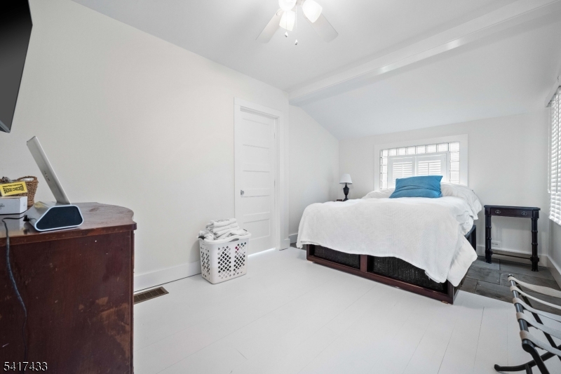 4 Dead End Road Newfoundland, NJ 07435 - Photo 19 of 24 a bedroom with a bed and with chair