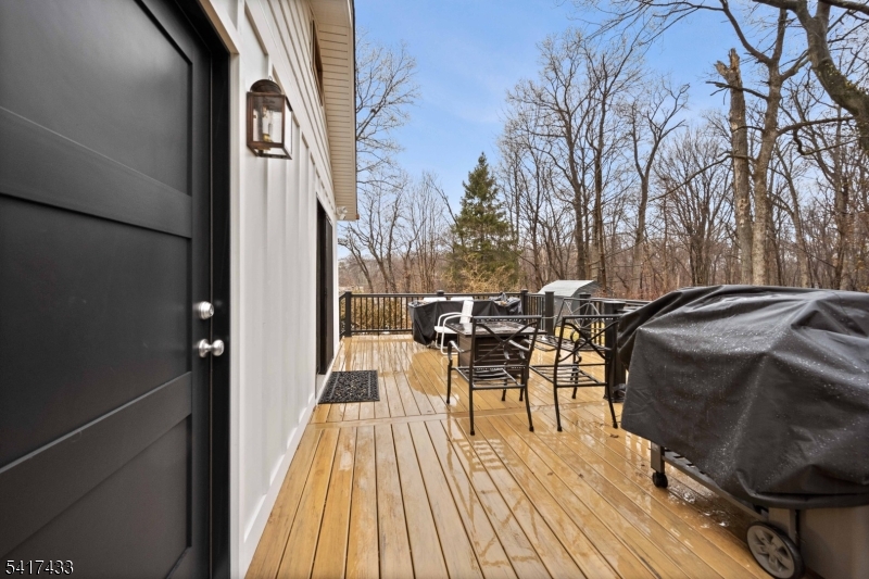 4 Dead End Road Newfoundland, NJ 07435 - Photo 23 of 24 a view of a dinning tables and chairs in patio of the house