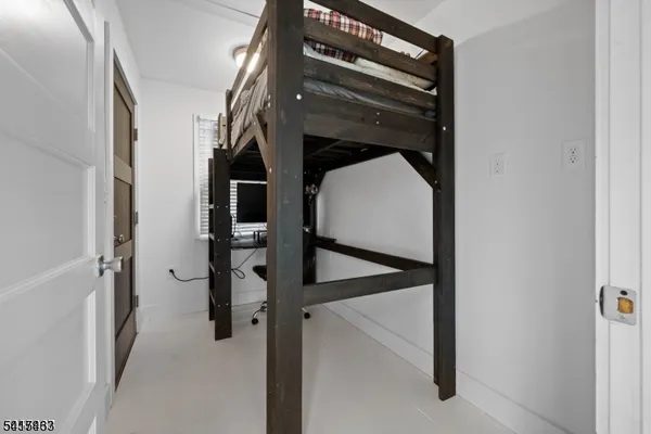 a view of staircase with railing and stairs