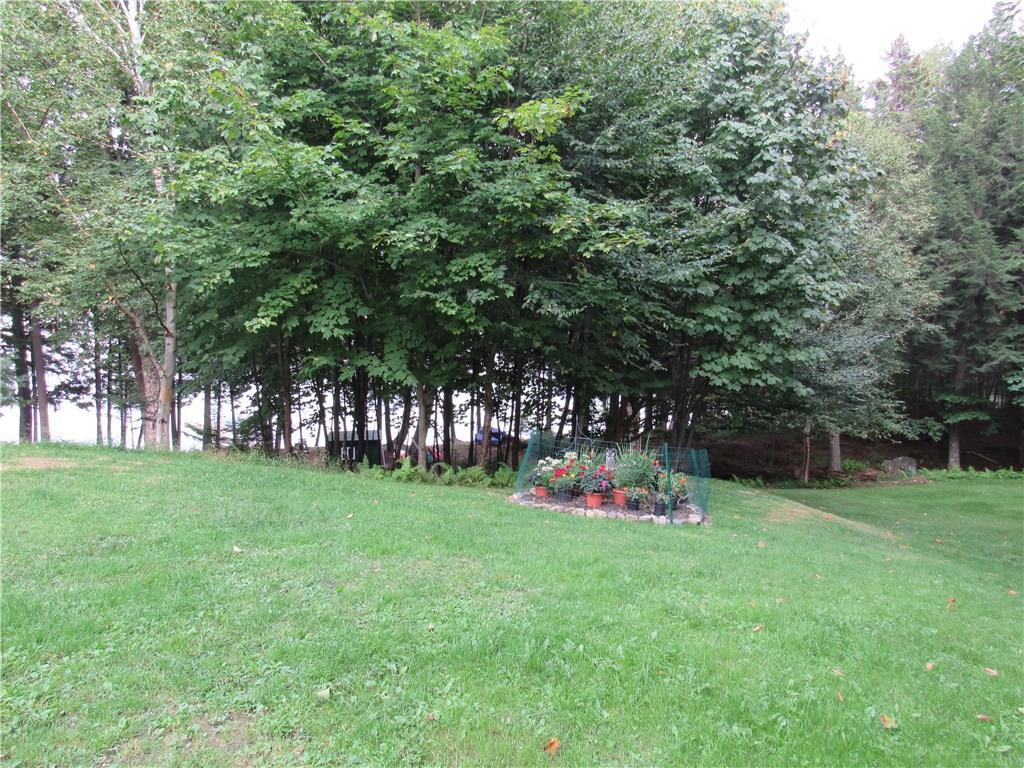 1043 Black Point Road Beaver Cove, ME 04441 - Photo 23 of 26 Beautiful flower gardens.