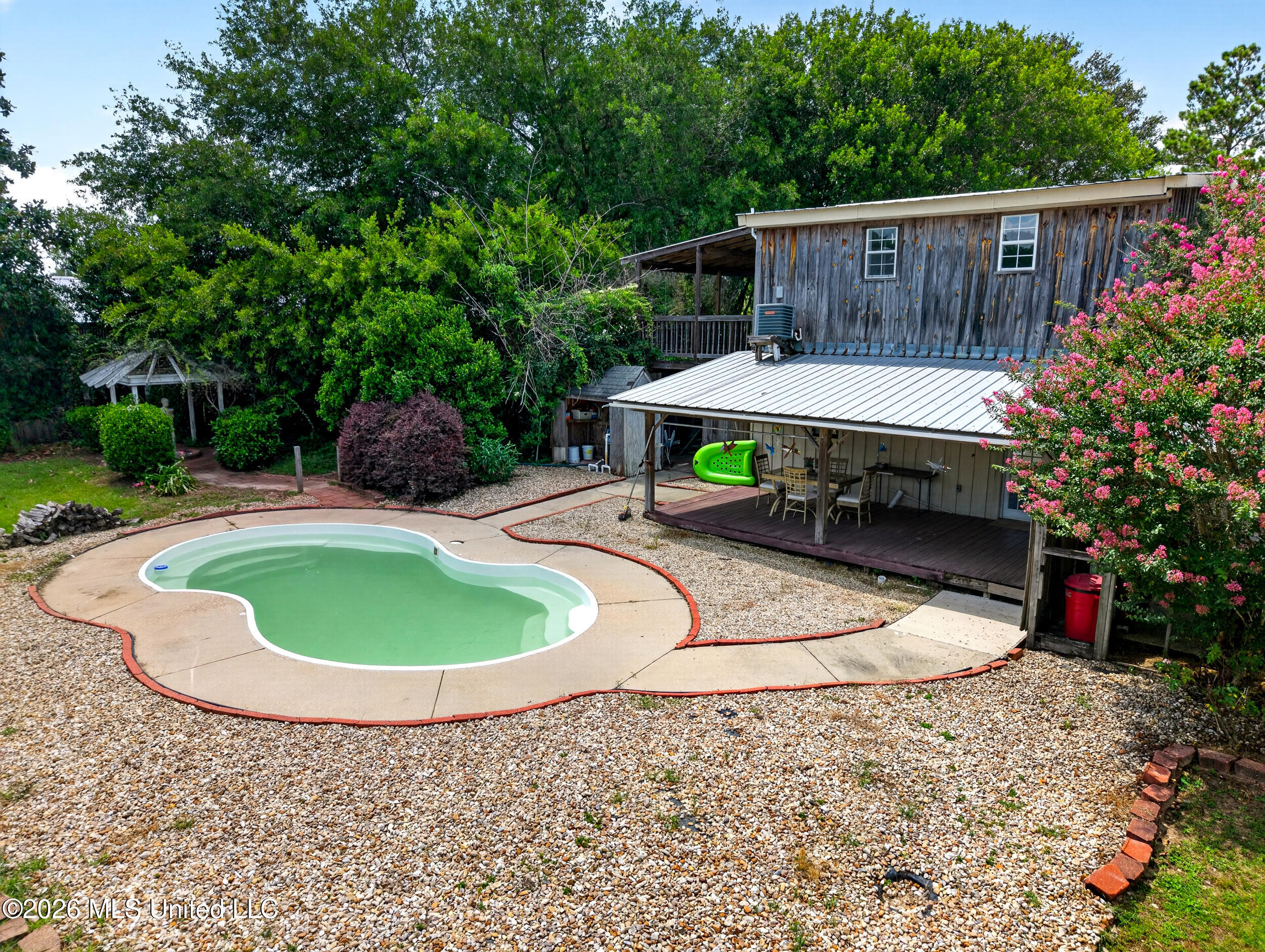 574 Slade Woodward Road Poplarville, MS 39470 - Photo 43 of 106 43_backyard_pool