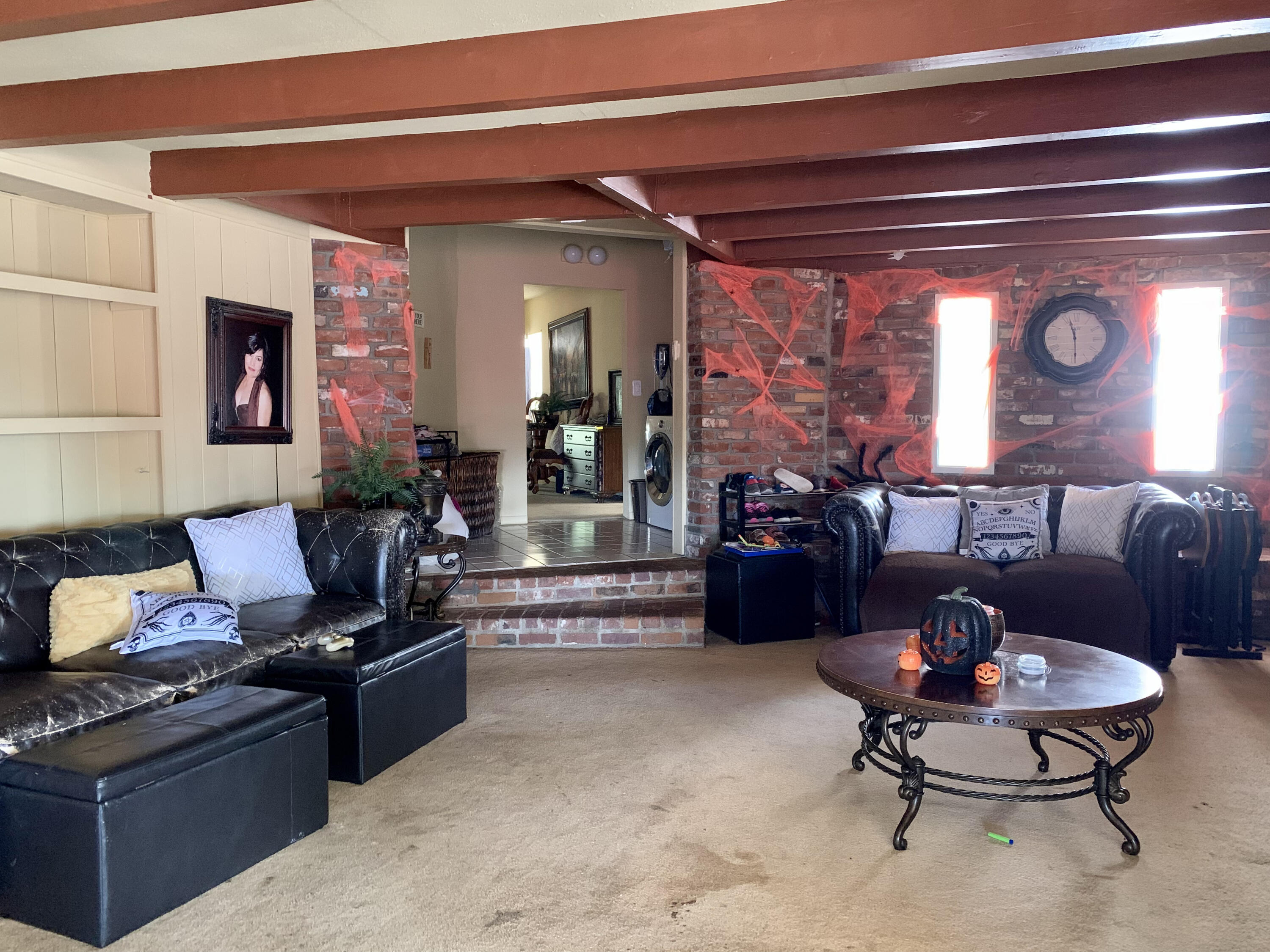 10968 Pettegrew Road Riverside, CA 92507 - Photo 1 of 14 a living room with furniture and a fireplace