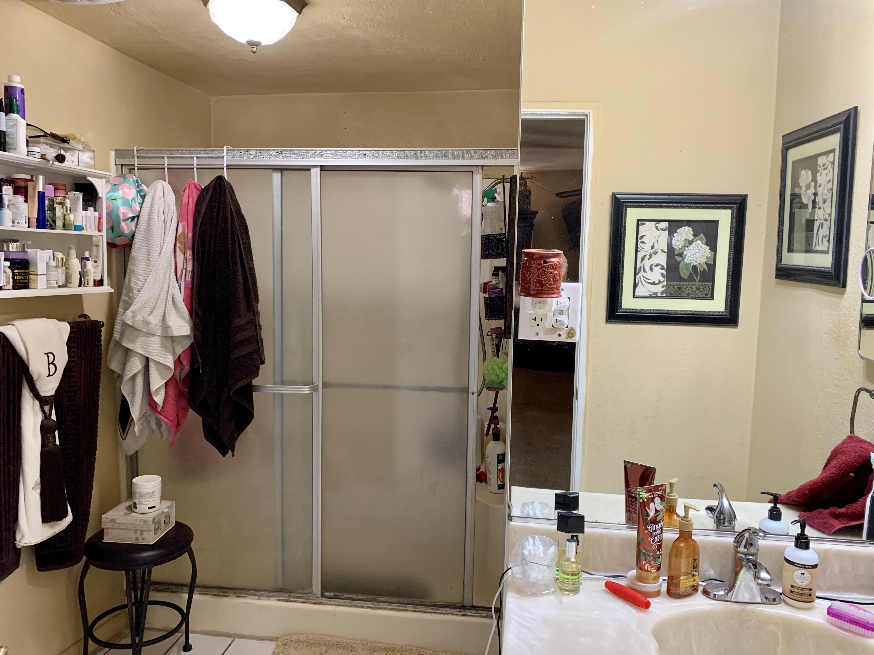 10968 Pettegrew Road Riverside, CA 92507 - Photo 5 of 14 a view of walk in closet with clothes and shoes