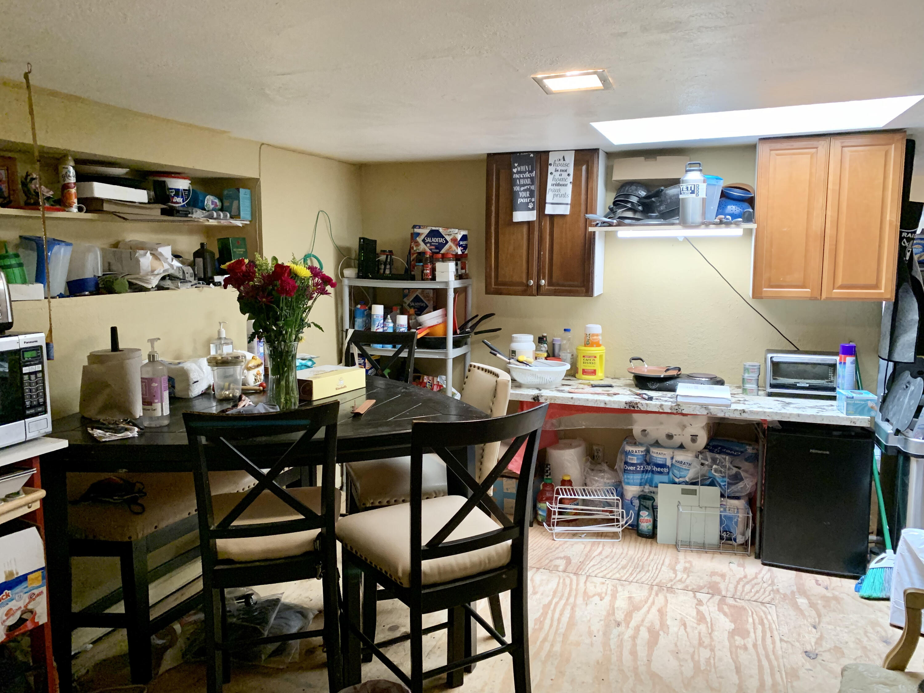 10968 Pettegrew Road Riverside, CA 92507 - Photo 9 of 14 a view of a dining room with furniture and a kitchen