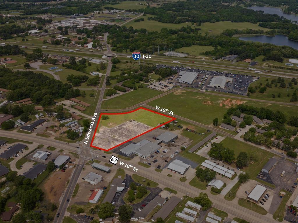 Tbd West 16th Street Mount Pleasant, TX 75455 - Photo 1 of 14 an aerial view of residential houses with outdoor space