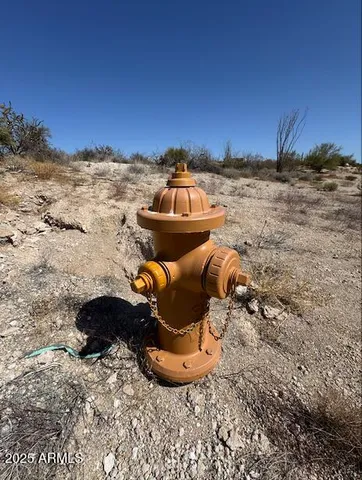 a view of a road with an ocean