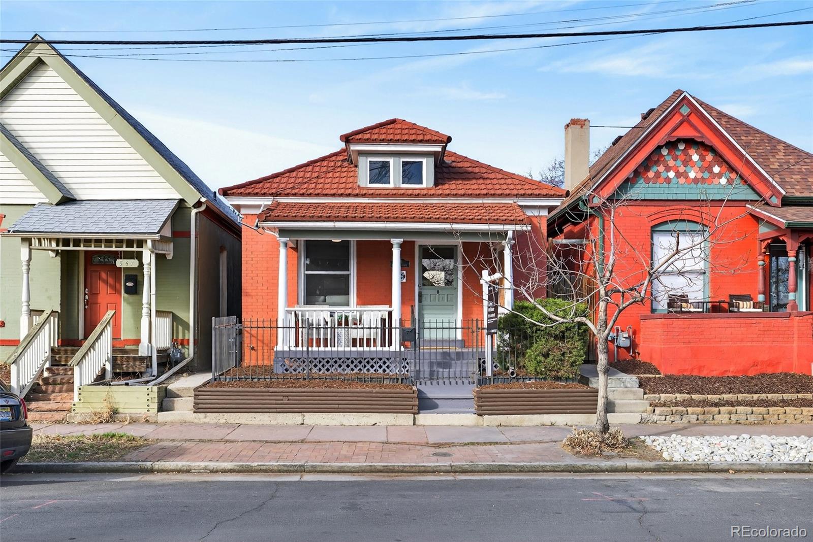 a front view of a houses on street