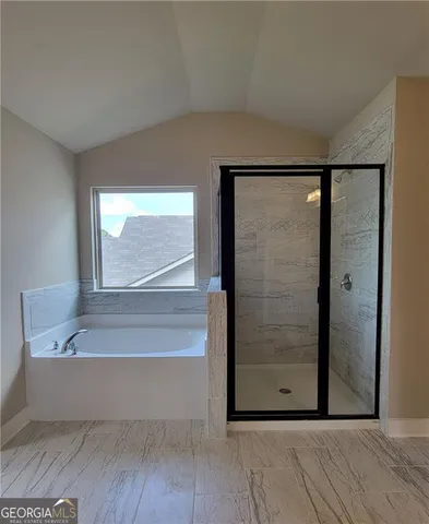 a view of bathroom with bathtub
