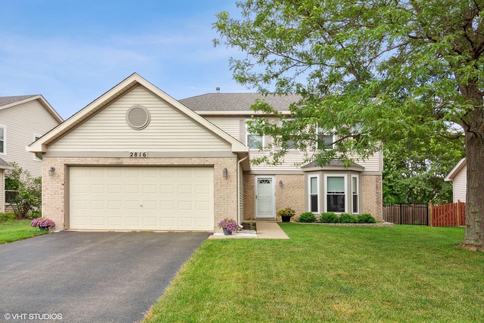 2816 Yosemite Drive Aurora, IL 60503 - Photo 1 of 18 a view of outdoor space yard and garage
