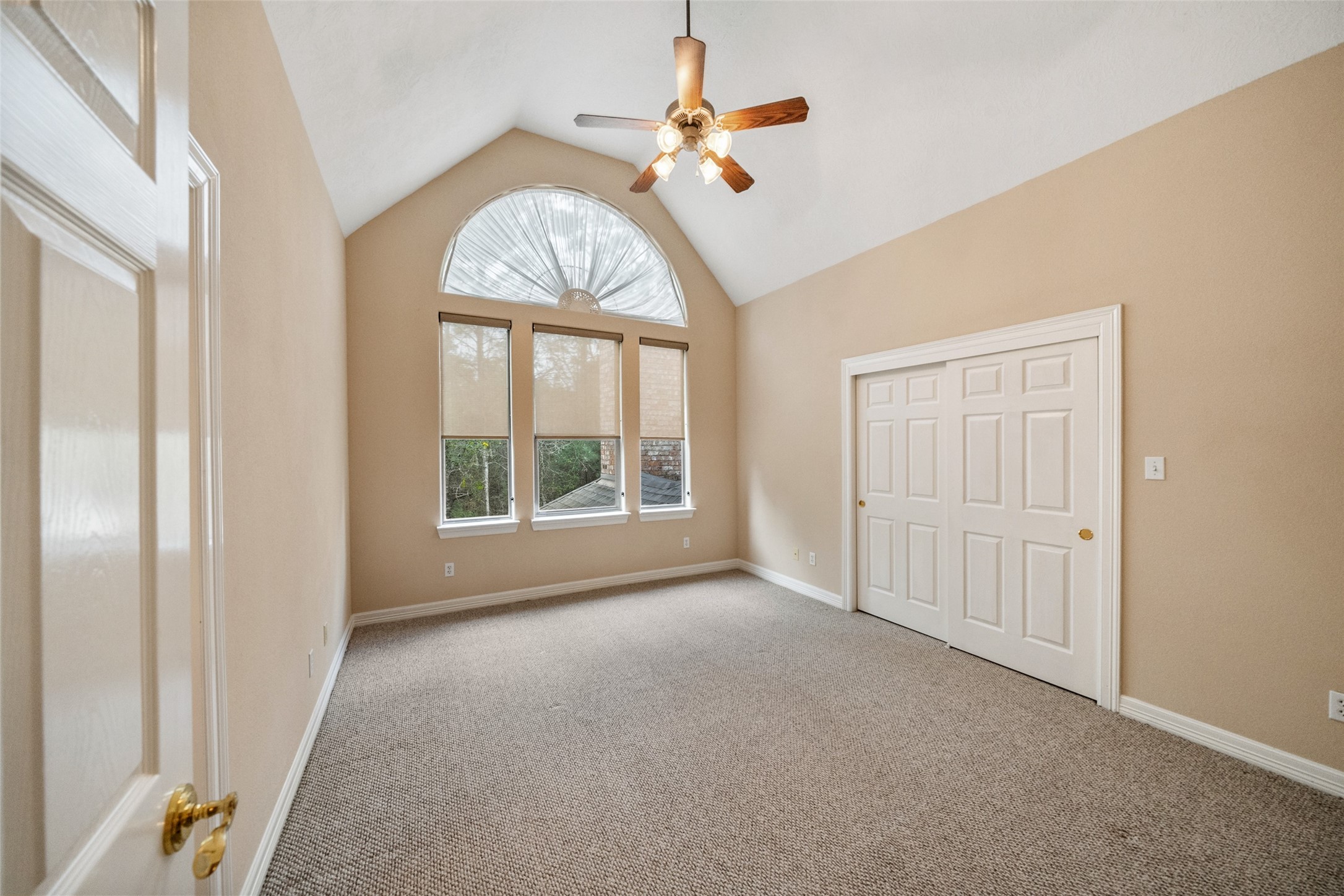 901 Longmire Road, Unit 28 Conroe, TX 77304 - Photo 25 of 31 an empty room with a window