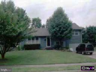 120 Pine Valley Road Riverside, NJ 08075 - Photo 1 of 1 a front view of a house with a garden