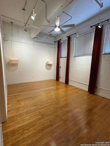 a view of a room with an empty space