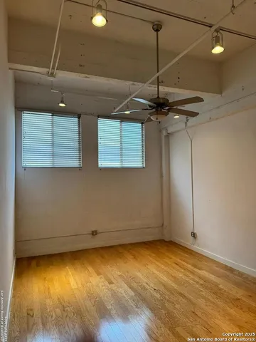 a room view with a wooden floor