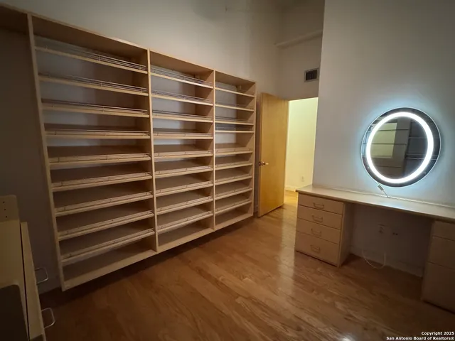 a room with a furniture and a window