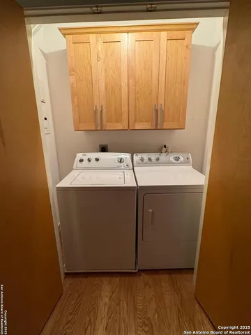 a room with a sink and a mirror