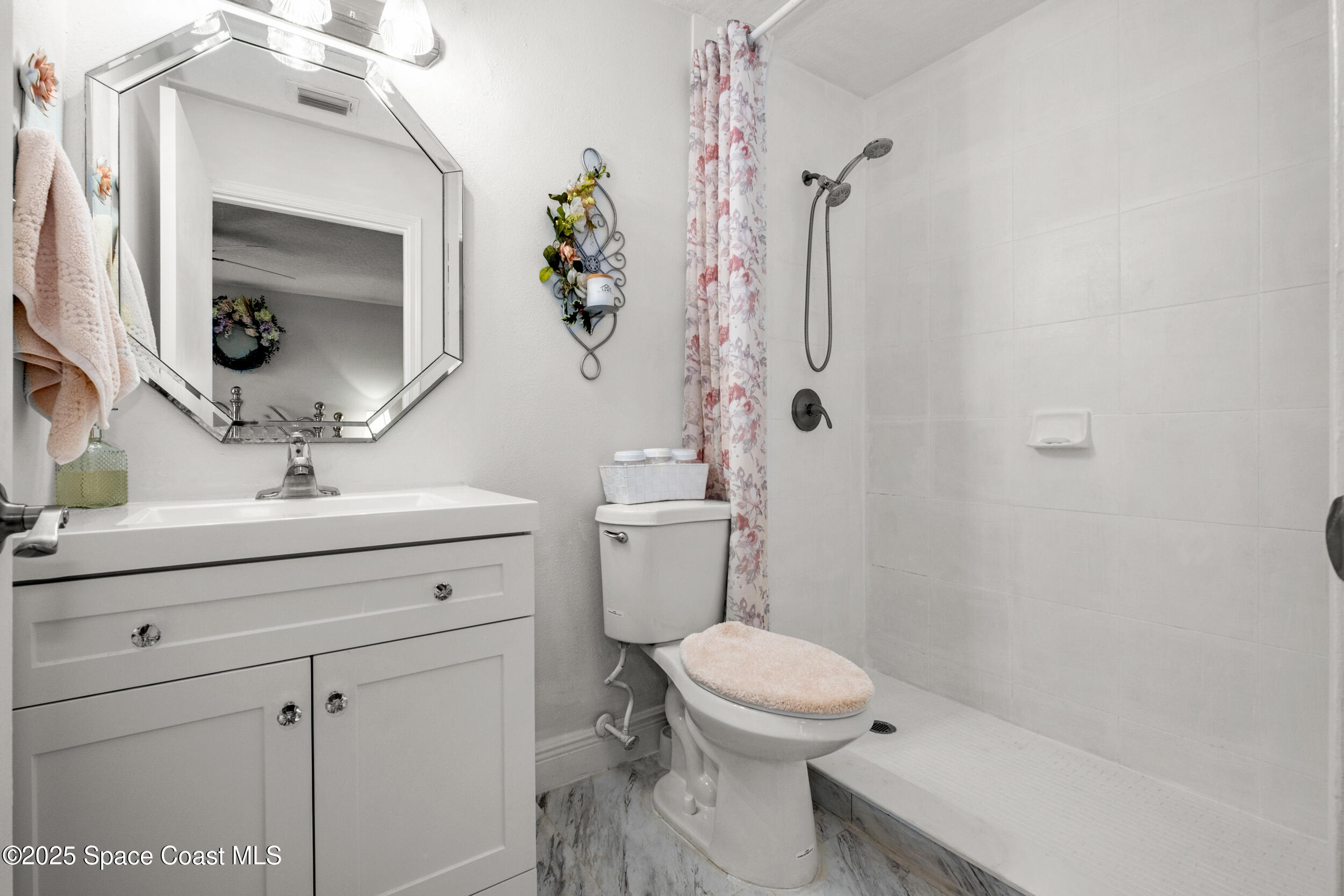 7667 North Wickham Road, Unit 302 Melbourne, FL 32940 - Photo 12 of 27 Main bath with walk in shower