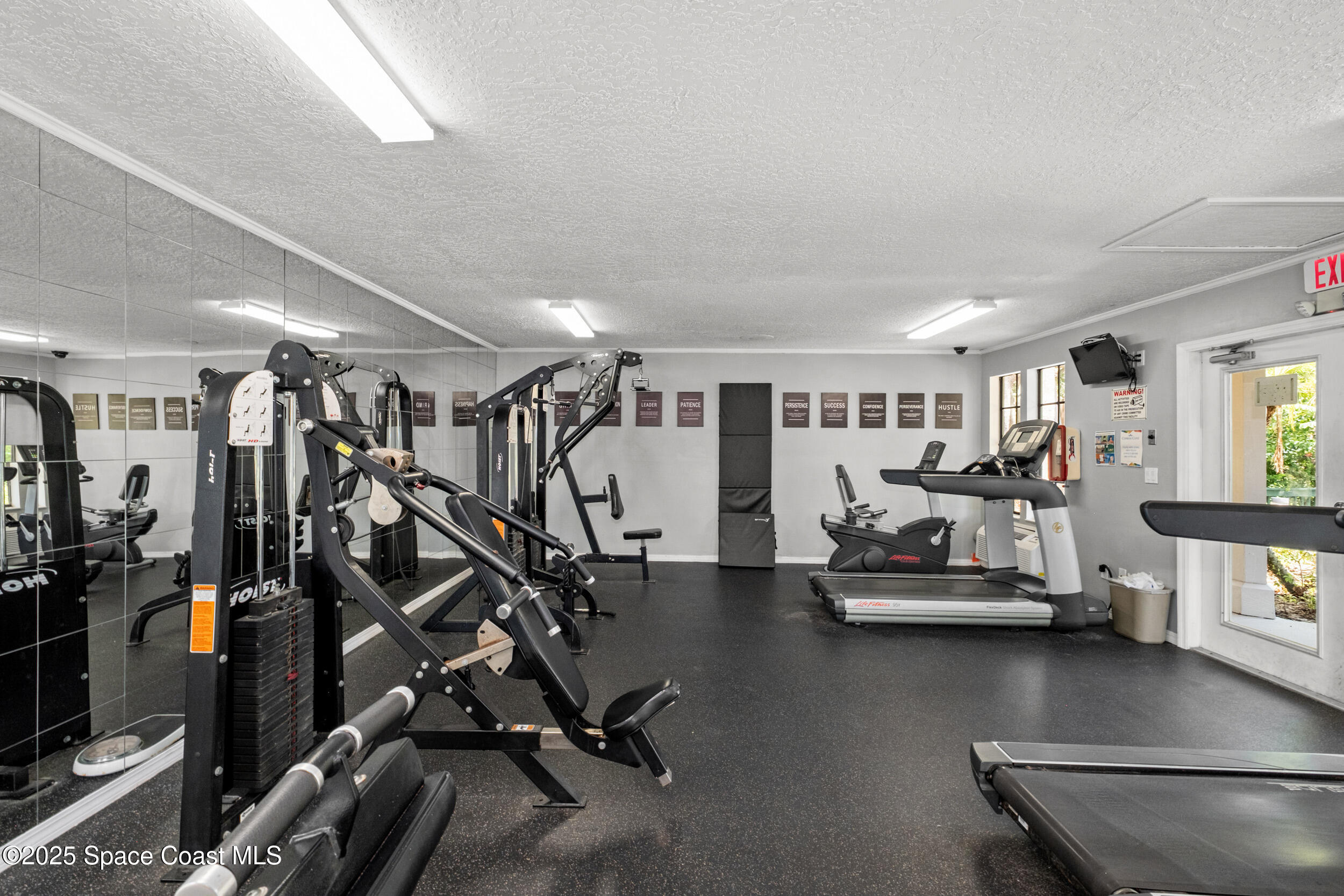 7667 North Wickham Road, Unit 302 Melbourne, FL 32940 - Photo 19 of 27 Work out here
