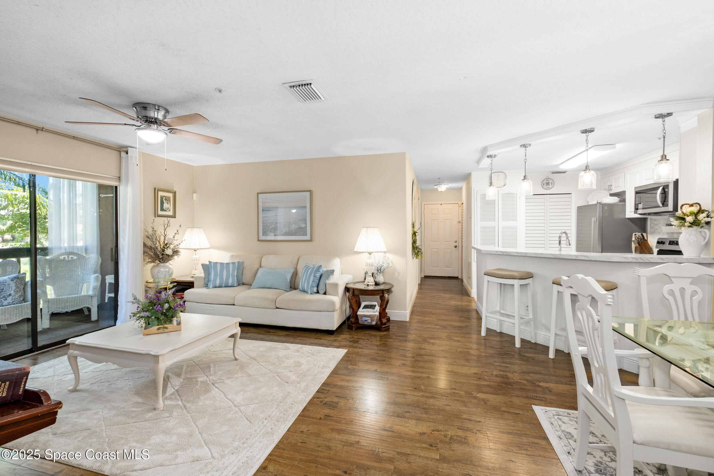 7667 North Wickham Road, Unit 302 Melbourne, FL 32940 - Photo 7 of 27 Engineered hardwood floor