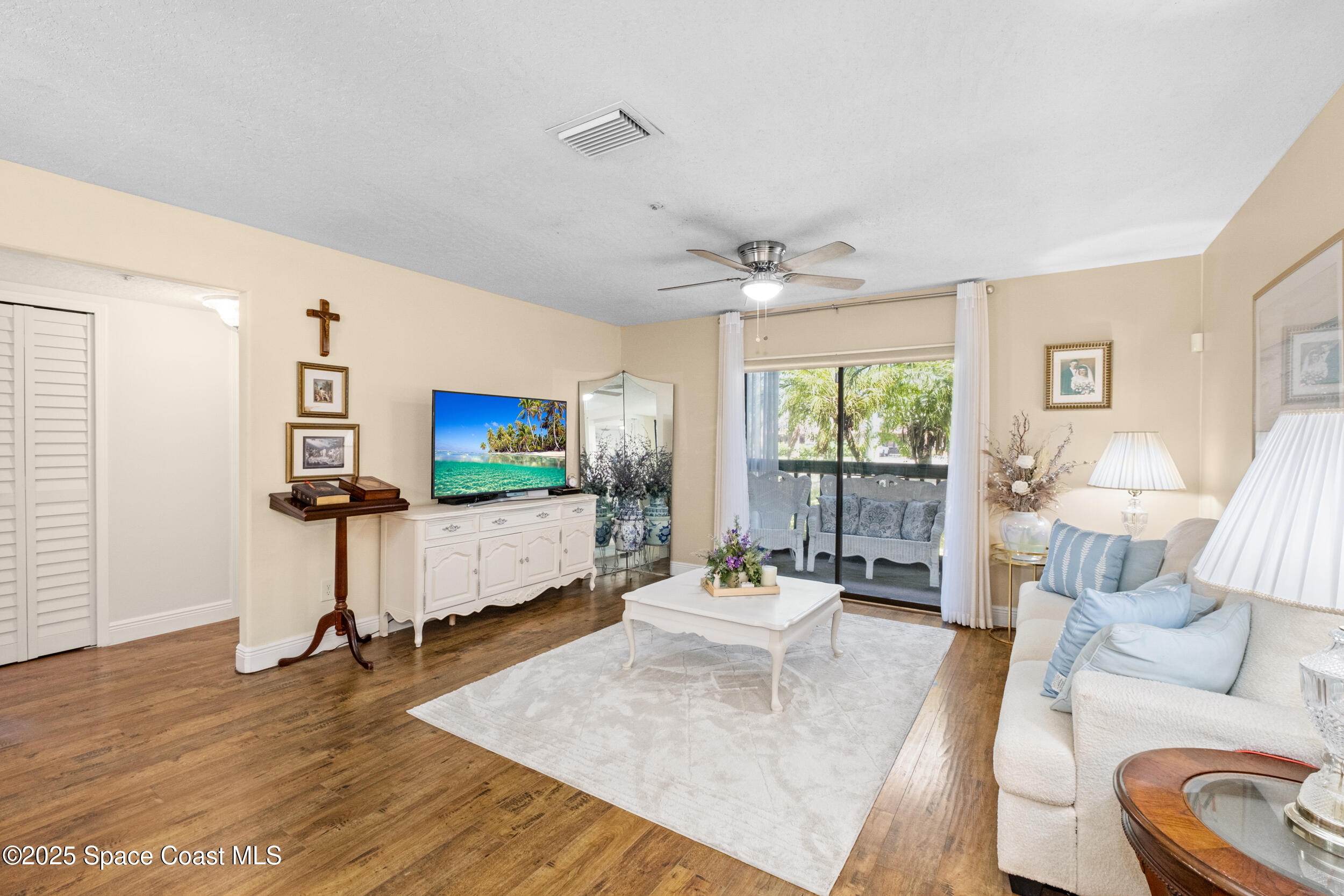 7667 North Wickham Road, Unit 302 Melbourne, FL 32940 - Photo 8 of 27 Sliders to porch