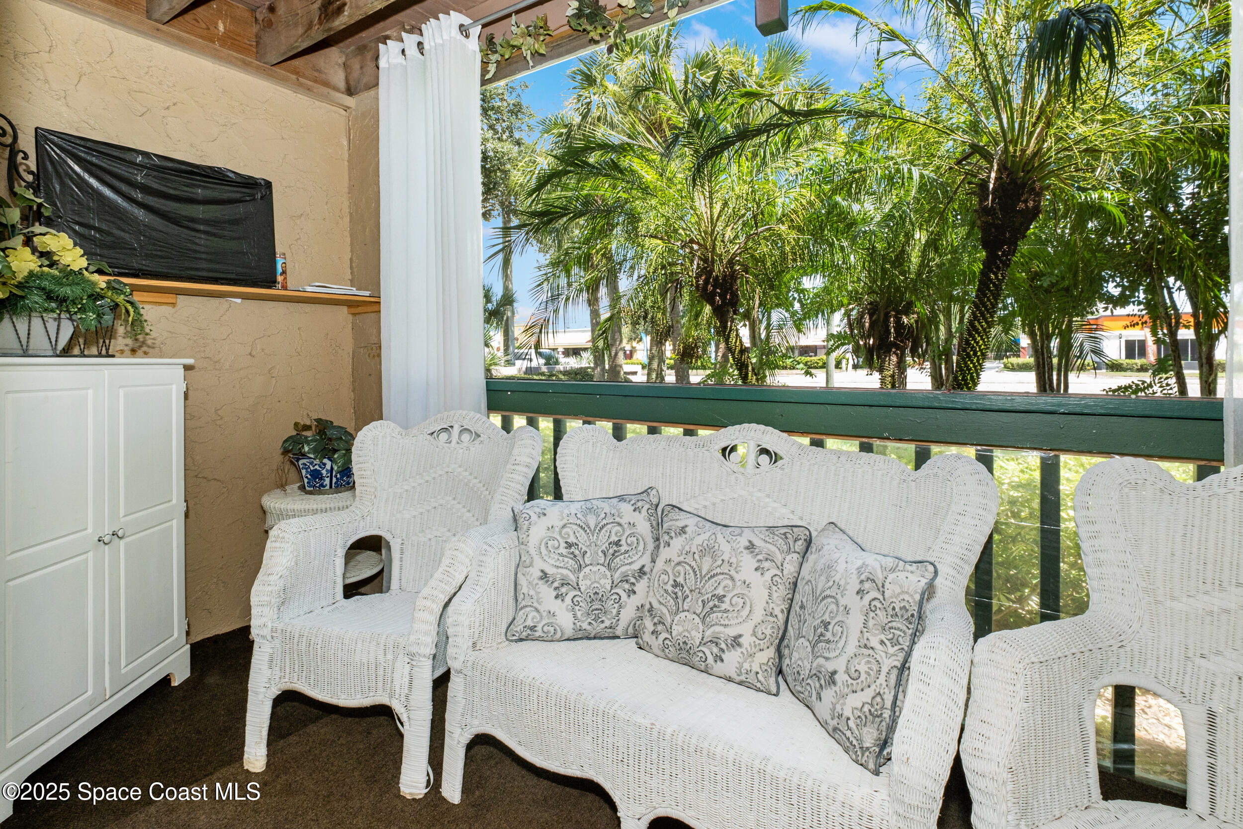 7667 North Wickham Road, Unit 302 Melbourne, FL 32940 - Photo 9 of 27 Screened porch