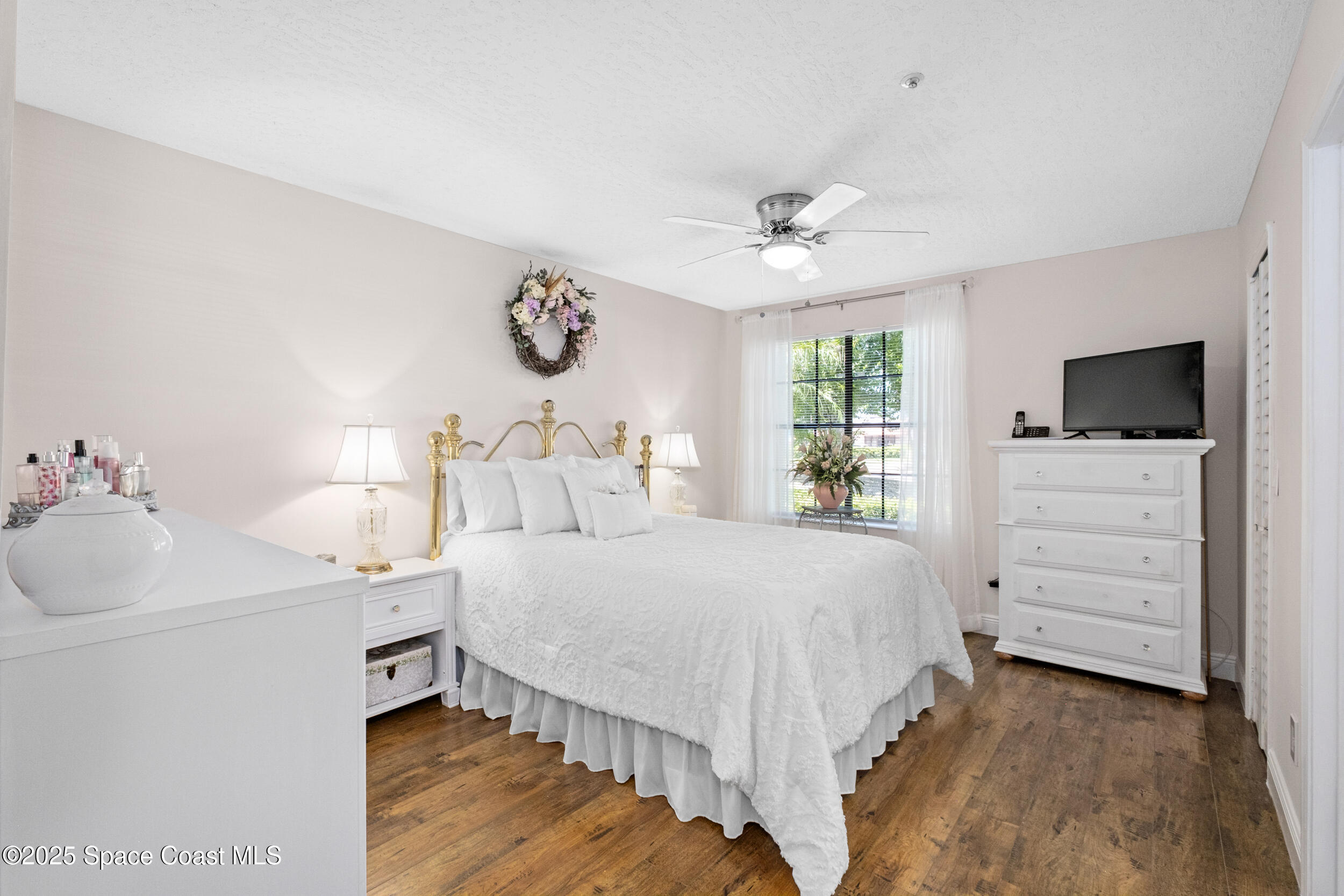 7667 North Wickham Road, Unit 302 Melbourne, FL 32940 - Photo 10 of 27 Main bedroom has lots of light